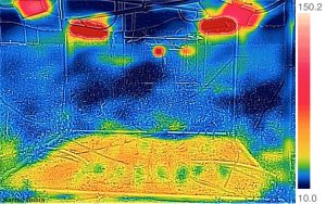 Infrared image of a heated plot. Hot lamps are reddest.