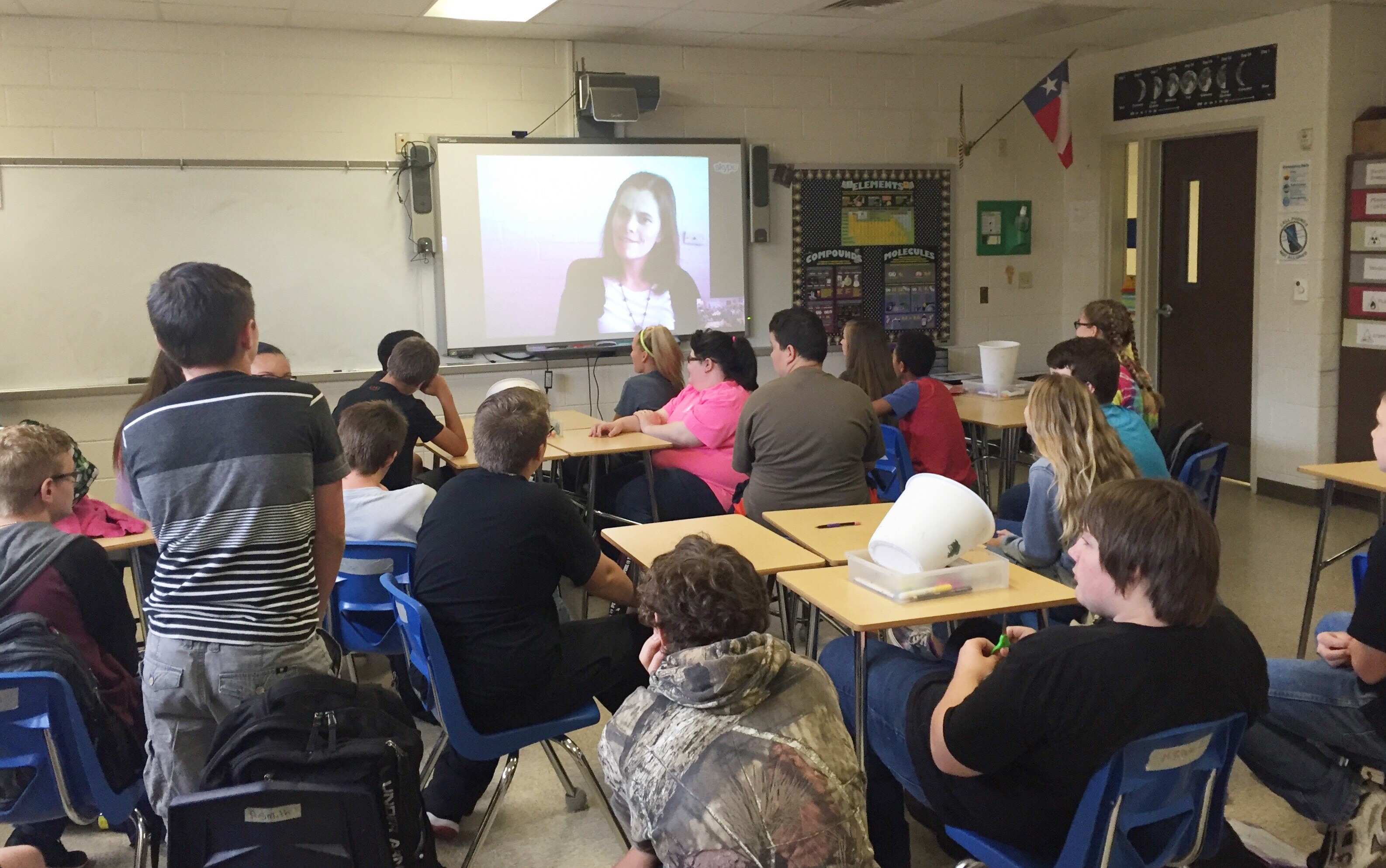 A junior-high in Texas watching an Ecoss scientist on a projected video call