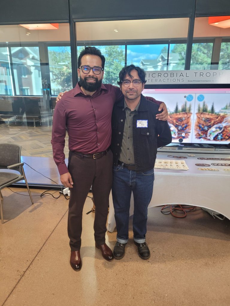 Two researchers at the Microbial Trophic Interactions station